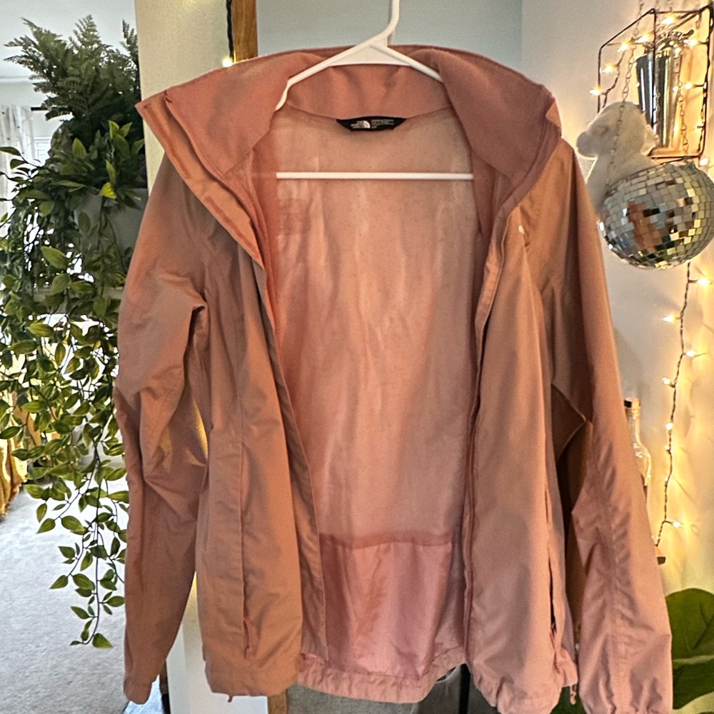 The north face pink light rain jacket